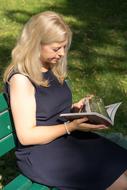 Woman Blond Reads