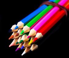 colored pencils linked together