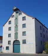 white house with blue windows