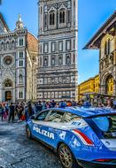 sports car against the backdrop of buildings