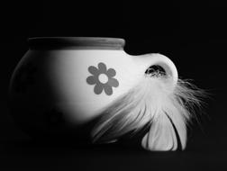 mug with a flower decorated with a feather