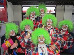 men in funny carnival costumes