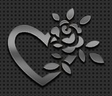 Beautiful heart and flower with leaves metal carving at black background