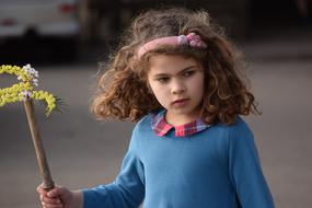 Curly Girl and flowers