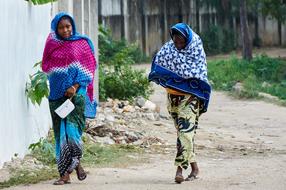 girls walking around in headscarves