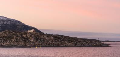 Cruise in Norway at beautiful colorful sunrise background