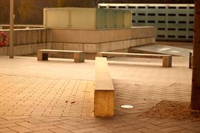 wooden benches and prefabricated concrete structure
