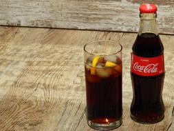 cold coca cola with lemon