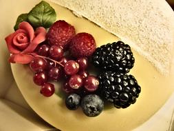 fruit birthday cake decorated with flowers