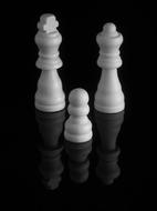 white figures on a black background