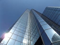skyscraper with glass facade on a sunny day