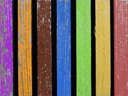 weathered painted Wooden Fence, colorful background