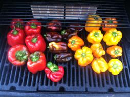 Delicious ripe peppers on the grill