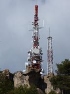 high tower with radio waves