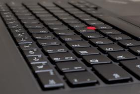 black computer keyboard and red button