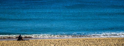 Guitar sand and sea