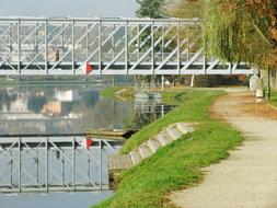 steel bridge and river bank in the Czech Republic