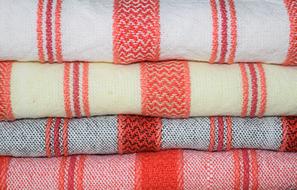 stack of red striped towels