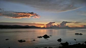 rocks in the sea at sunset