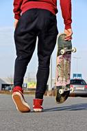 skater Boy in red sneakers