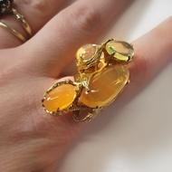 ring with orange beautiful stones