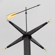 compass statue against the sky