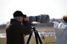 photo of man Bird Watchers Camera