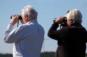 Binoculars Curious Couple