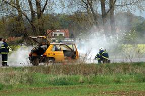 extinguishing a yellow car on the road