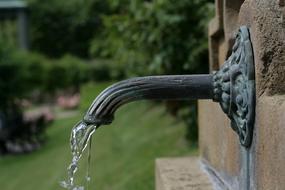 tap water running off the wall