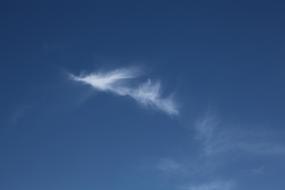 silhouette of a white cloud in the sky