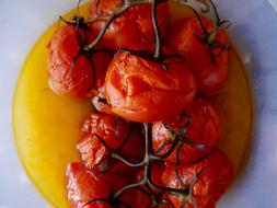 Delicious ripe tomatoes on the table