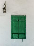 wooden green window on white wall