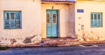 old house with wooden shutters