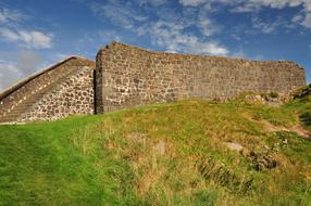 green grass near Stone Wall