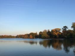 beautiful lake by the autumn forest