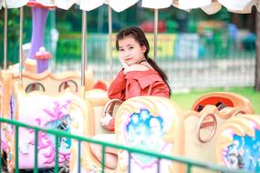 Model Girl on the carousel