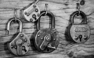 iron lock on a wooden wall