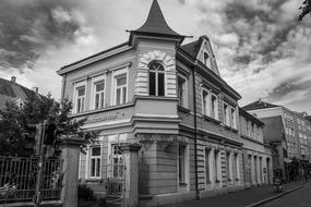 architecture of a corner house in germany, black and white