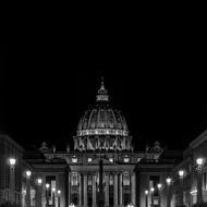 Black and white photo of the beautiful cathedral with lights in Vatican