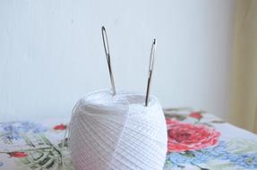 needles in white threads