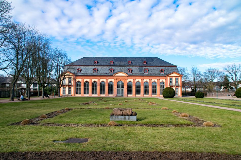Beautiful orangery at blue sky background with white clouds in Darmstadt, Germany