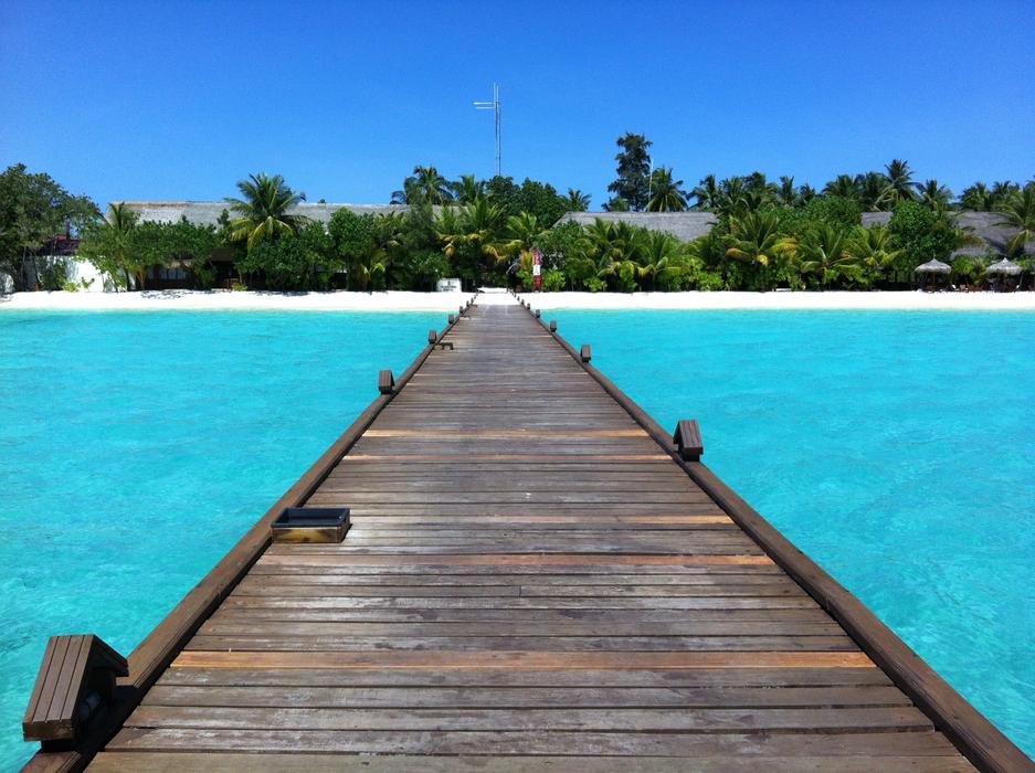 The wooden bridge with the ocean blue