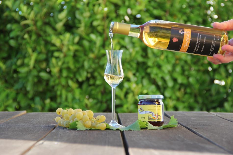 wine with grapes on the table