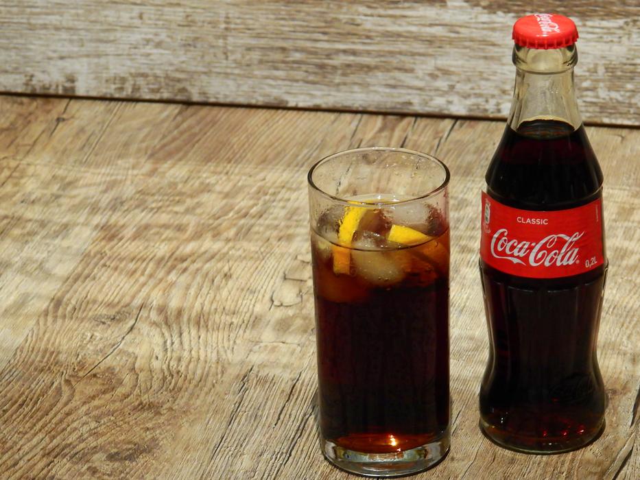 cold coca cola with lemon