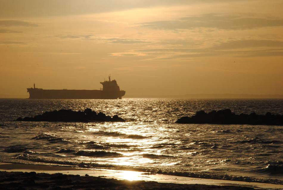 a huge ship in the sea under the sun