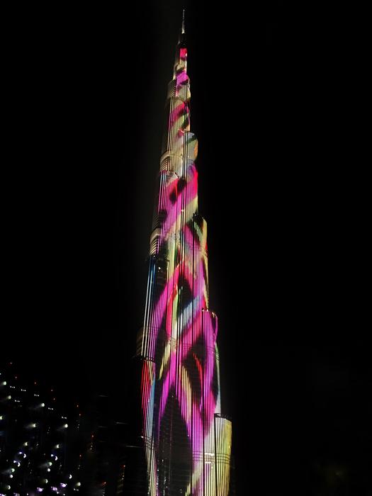 city tower in colored lights