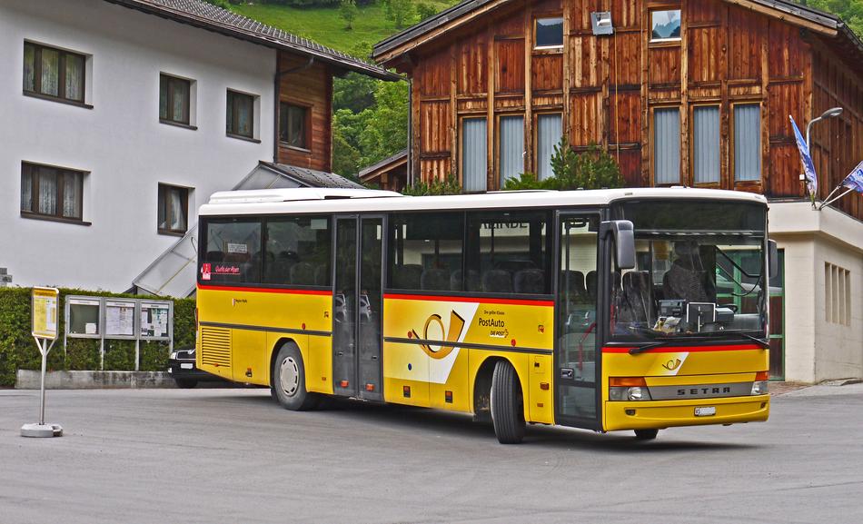 yellow bus in the parking lot