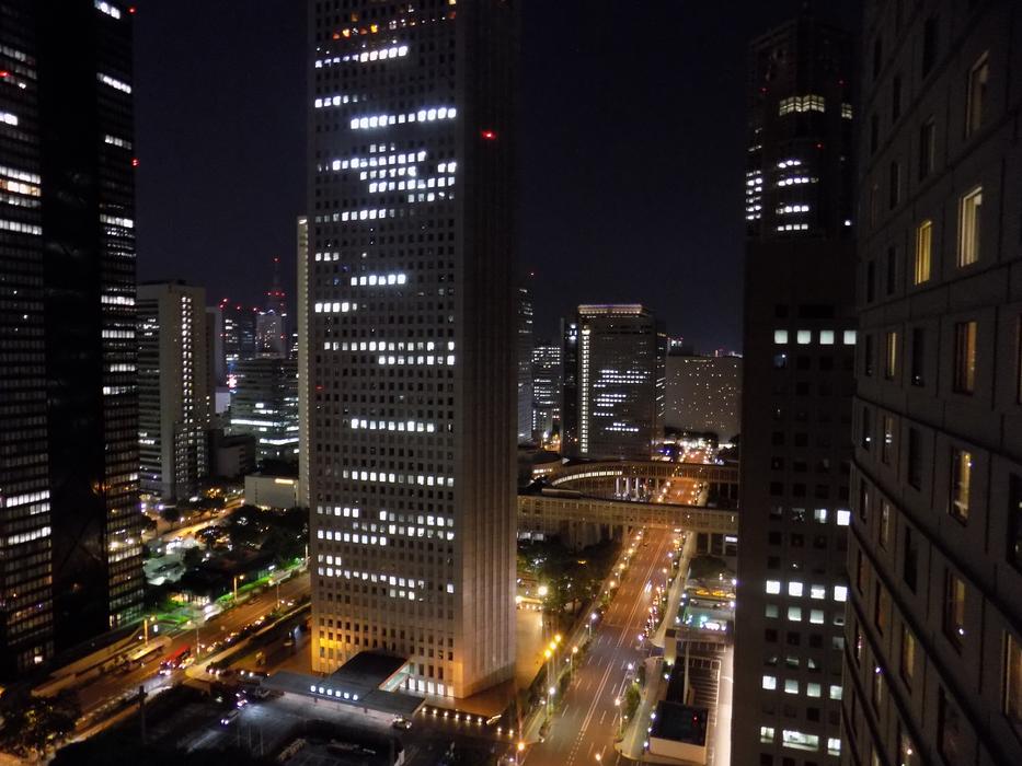 the burning lights of the city before