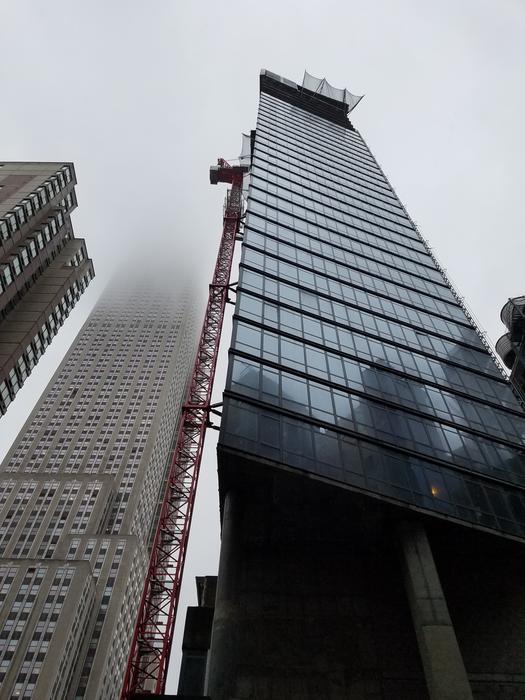 skyscrapers of Manhattan in fog, US